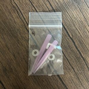 4 Gauge pink tapers with clear rings